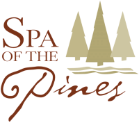 A logo reading “Spa of the Pines” with pine trees and wavy water lines below.