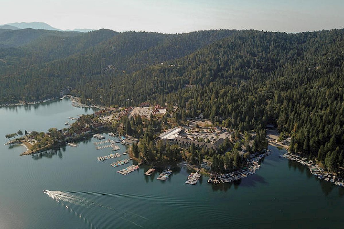 Aerial View of Lake Arrowhead Resort with mountains in background